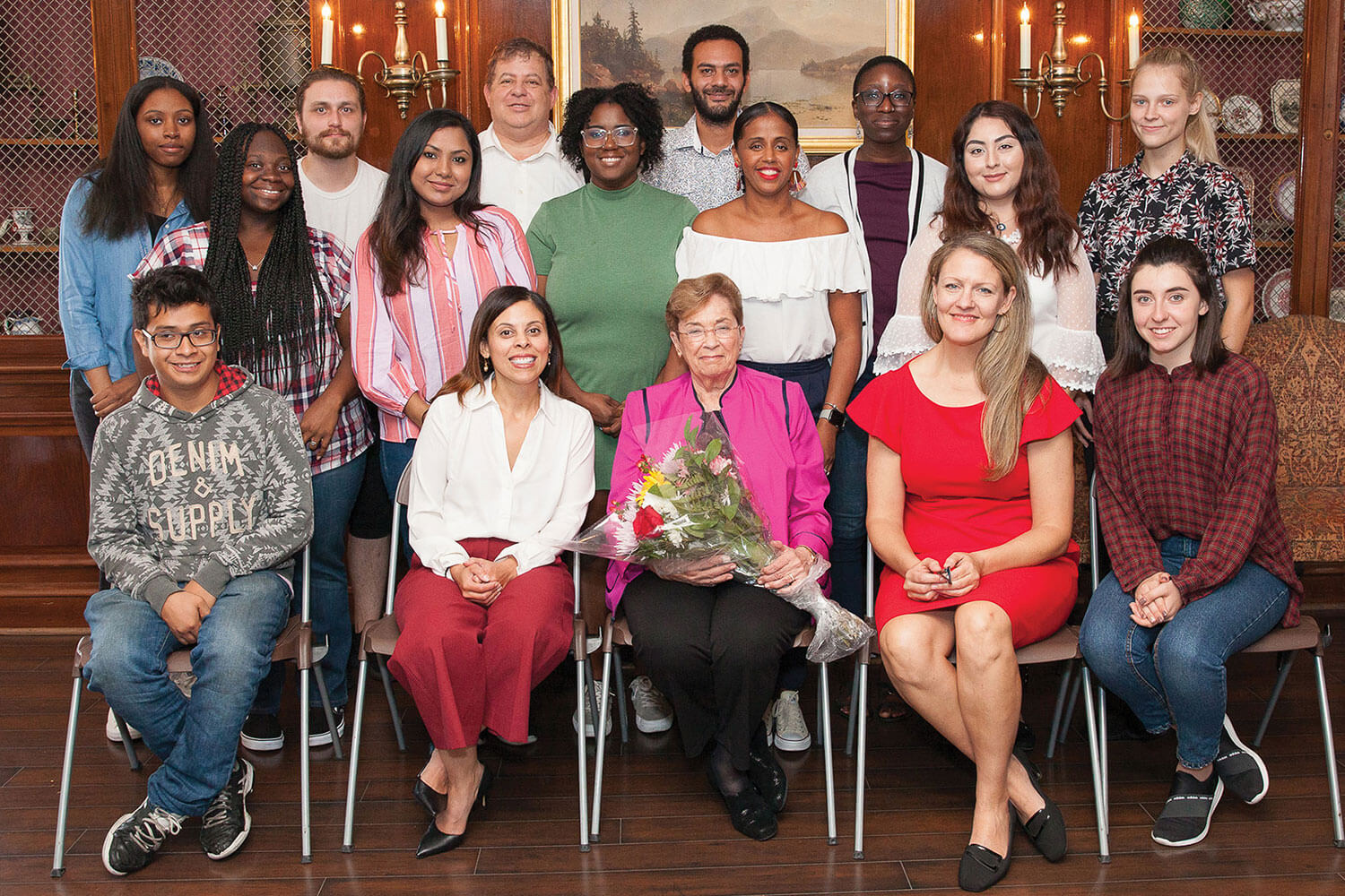 Carol Zicklin ’61 (seated at center) with students and President Michelle J. Anderson at the Zicklin Summer Fellows awards luncheon in September.