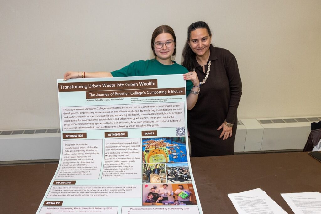 President of the Sustainability Club and Macaulay Honors student from the Urban Sustainability Program Sofia Mariyamis presents Brooklyn College's composting initiative with Professor of Economics Nadia Doytch during the Sustainability Fair on April 18.