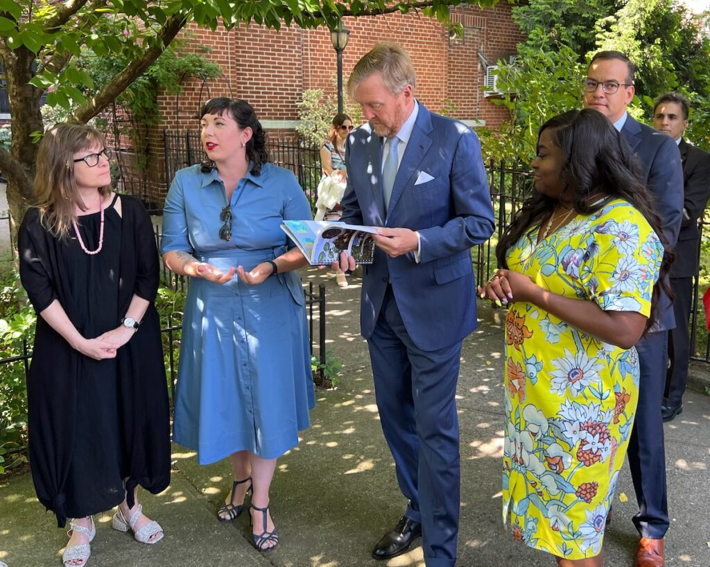Brooklyn College Assistant Professor of Anthropology Kelly Britt (left) meets with King Willem-Alexander (third from left) and community members including Allyson Martinez from Brooklyn Level Up (far right).