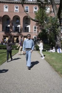 Student walking in fashion show.