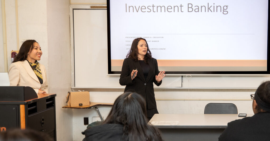 (Left to right) Assistant Professor Ngoc Cindy Pham and Amber Creighton of Cathay Securities, Inc., address Koppelman School of Business students.